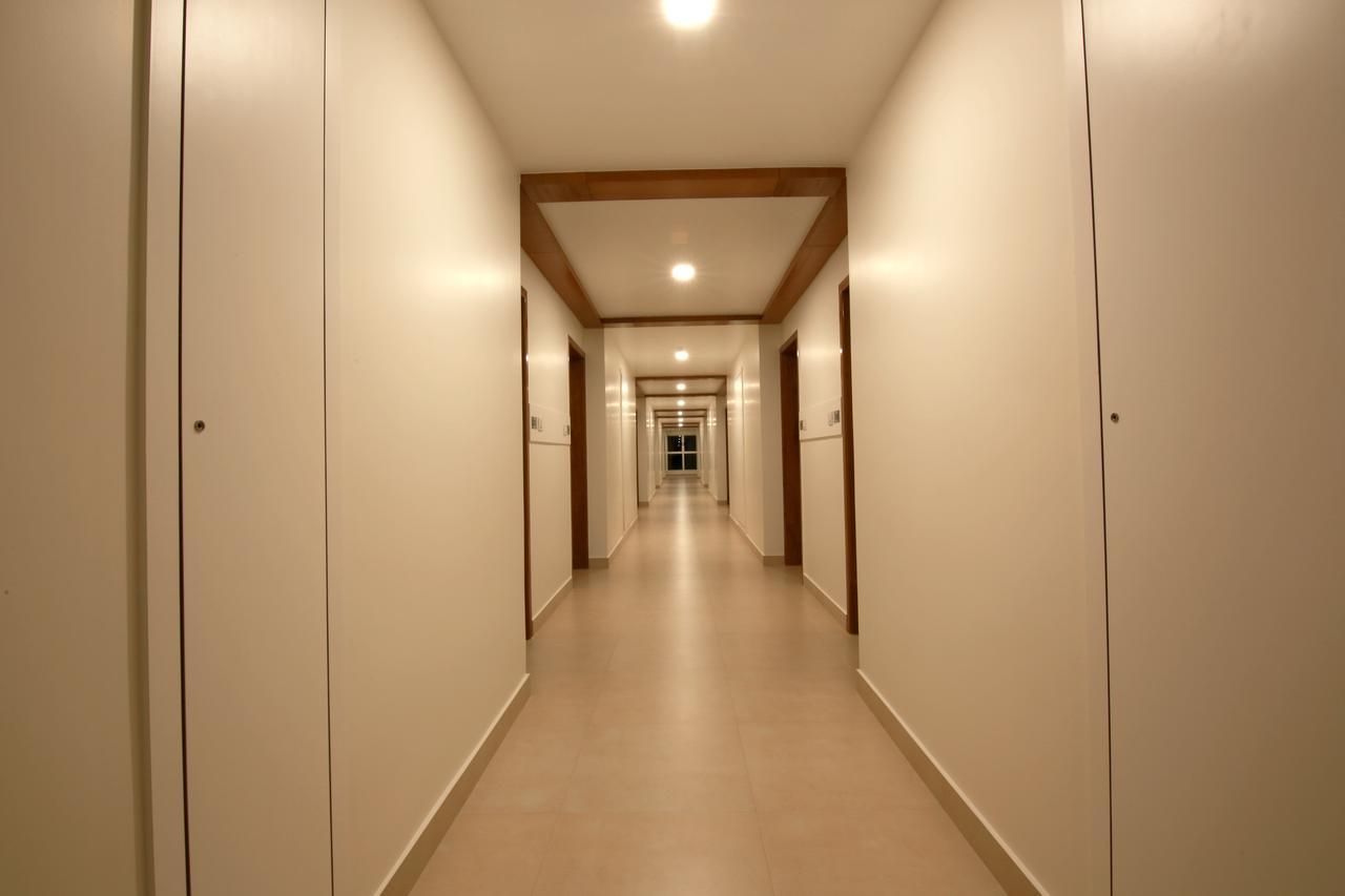 Palguni Residency Hotel Хасан Екстериор снимка