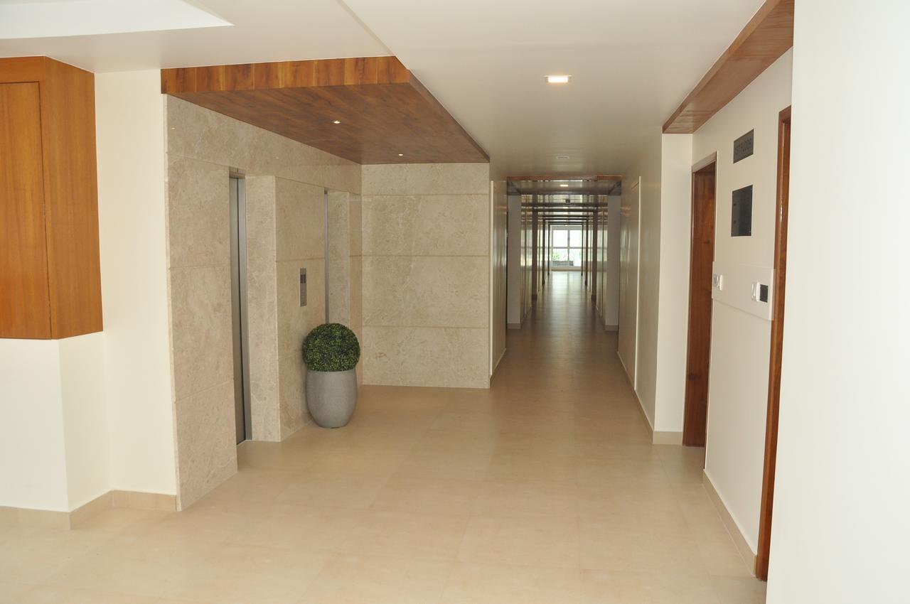 Palguni Residency Hotel Хасан Екстериор снимка