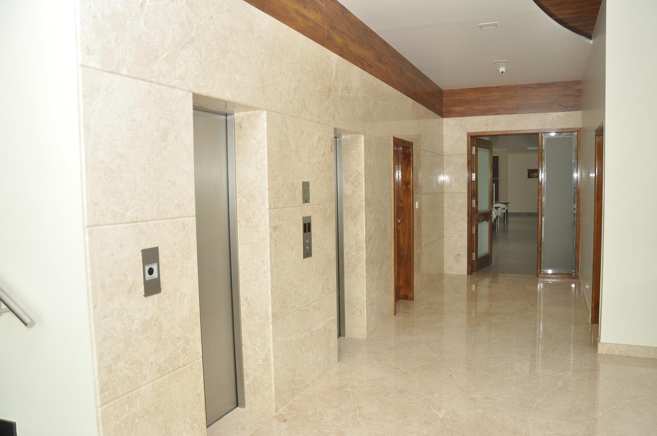 Palguni Residency Hotel Хасан Екстериор снимка